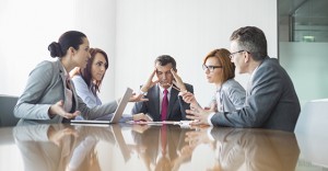 Businesspeople arguing in meeting